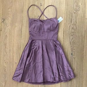 Satin mini- dress with cross laces on back perfect for any occasion 💜